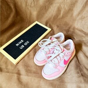 Girls’ Pink Nikes 12C